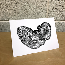 Load image into Gallery viewer, Card featuring a high quality ink jet print of an original relief print of a section of fallen cedar tree salvaged in Rollingwood, Texas.